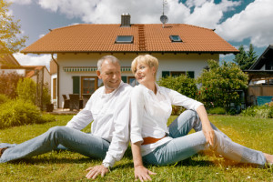 couple in front of house smallest